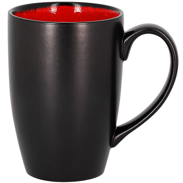 A black and red porcelain mug with a red rim.