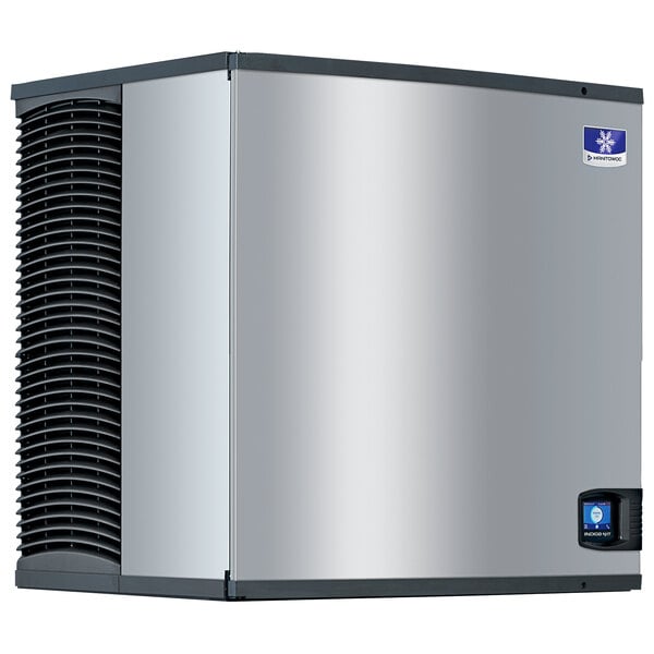 A silver rectangular Manitowoc air cooled ice machine with black and silver parts.