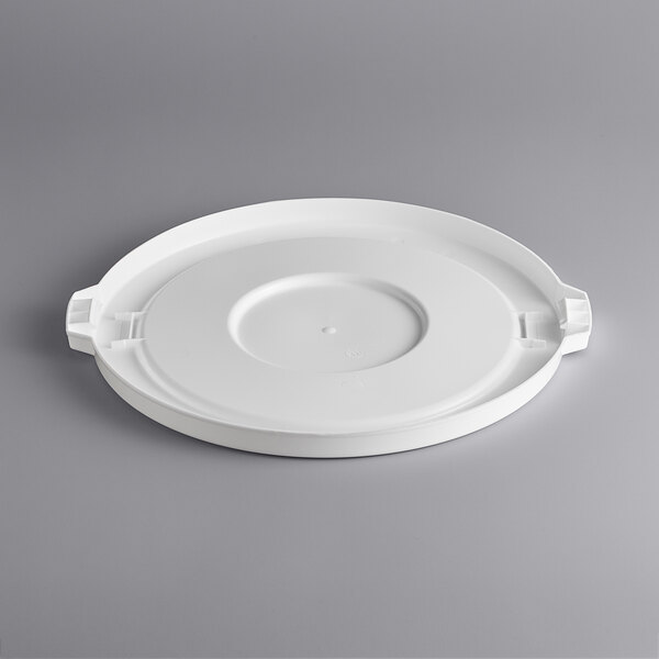 A white plastic lid with a handle.