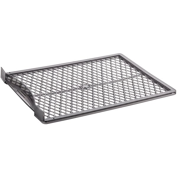 A metal grid with a curved edge.