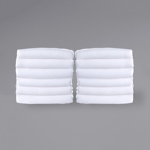 Foundations FS-NF-WH-12 SafeFit 38" x 24" x 4" White 100% Cotton Elastic Fitted Sheet Set for 1"-4" Compact Crib Mattresses - 12/Pack