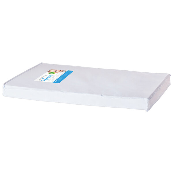 A white Foundations InfaPure crib mattress with a blue label.