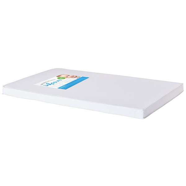 A white Foundations InfaPure crib mattress with a blue label.