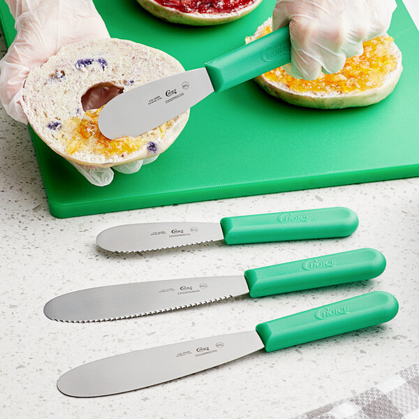 Choice 5 1/2" Smooth Stainless Steel Sandwich Spreader with Green