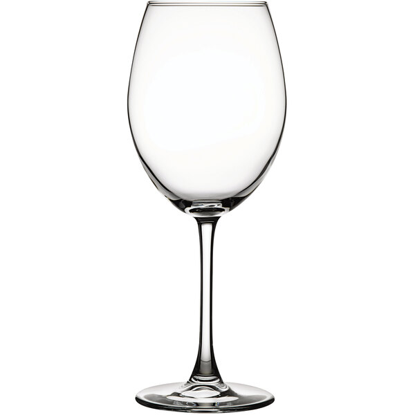 A close-up of a clear Pasabahce Enoteca red wine glass with a stem.