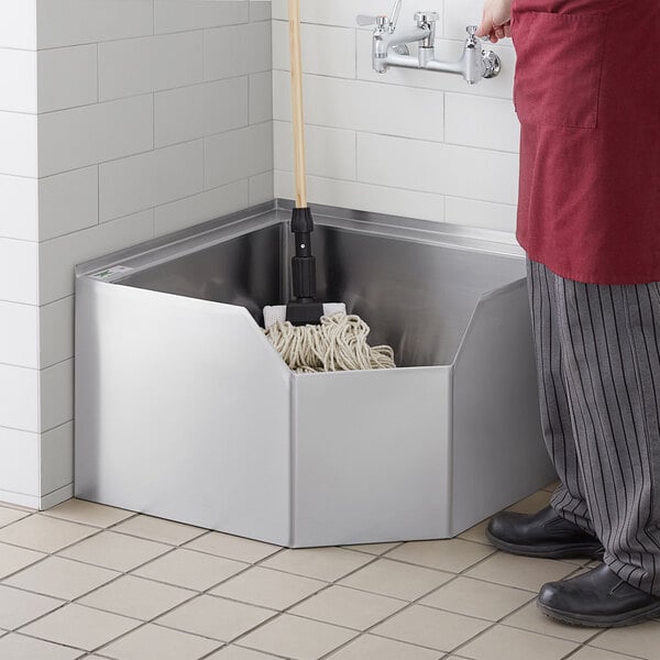 Regency 16-Gauge Stainless Steel One Compartment Corner Mop Sink with Notched Front - 24" x 24" x 12" Bowl