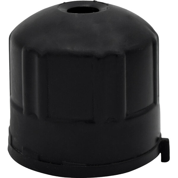 A black rectangular plastic cap with a hole in it.