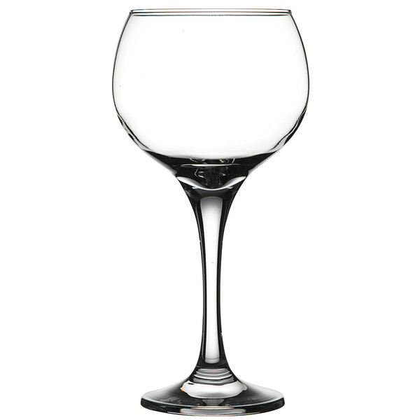 A close-up of a clear Pasabahce Ambassador wine goblet with a stem.