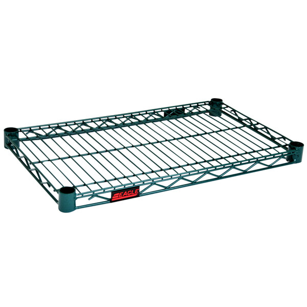 An Eagle Group green epoxy wire shelf on a metal rack with a red label.