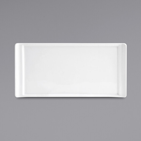 A close-up of a white rectangular Front of the House Nouvelle porcelain plate.