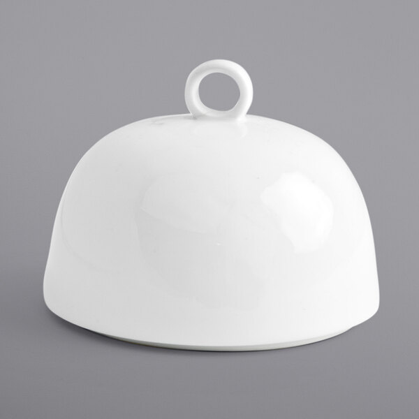 A white bell-shaped porcelain cloche with a round top.