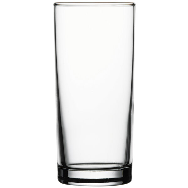 A close-up of a Pasabahce highball glass with a clear bottom.
