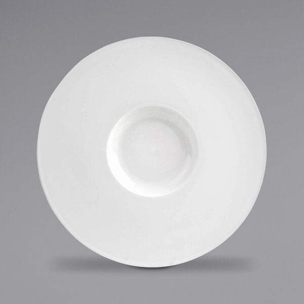 A bright white porcelain plate with an extra wide rim.