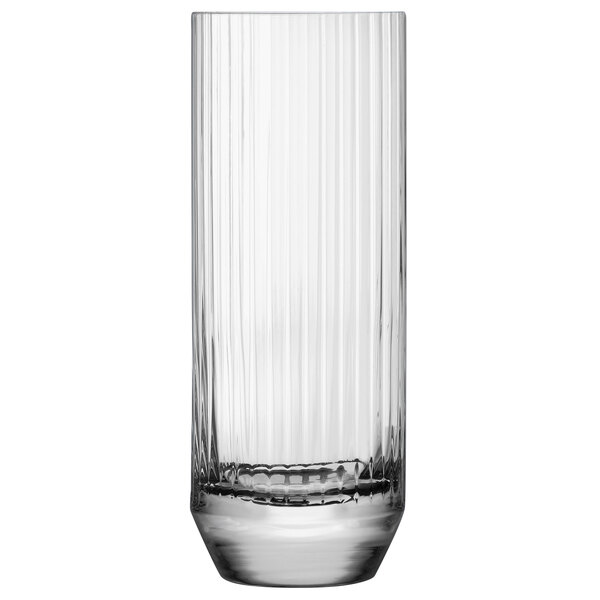 A close-up of a Nude Big Top highball glass with a ribbed rim.