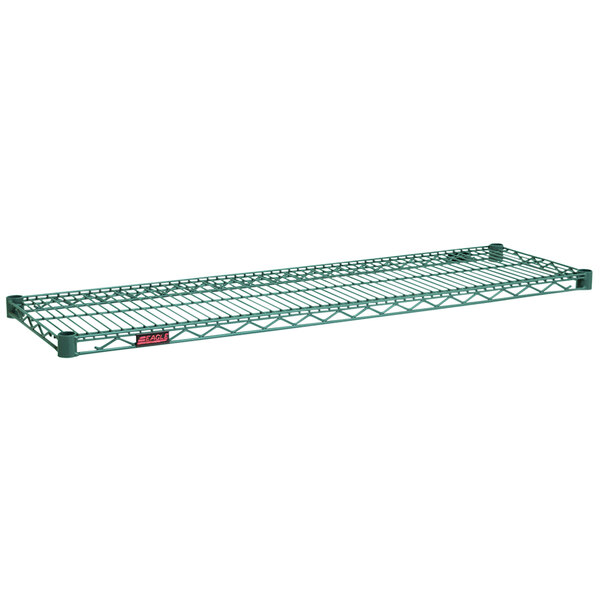 A green metal wire shelf by Eagle Group.