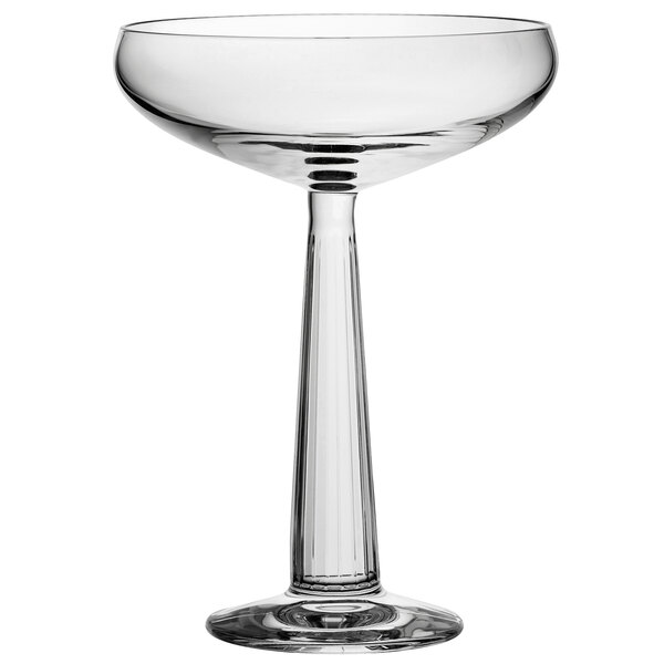 A Nude Big Top coupe wine glass with a tall stem.