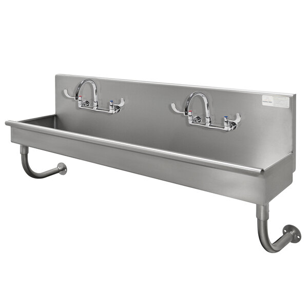 A stainless steel Advance Tabco multi-station utility sink with two faucets.