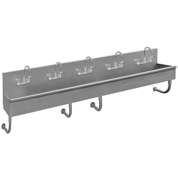 A stainless steel multi-station hand sink with 5 manual faucets and hooks.