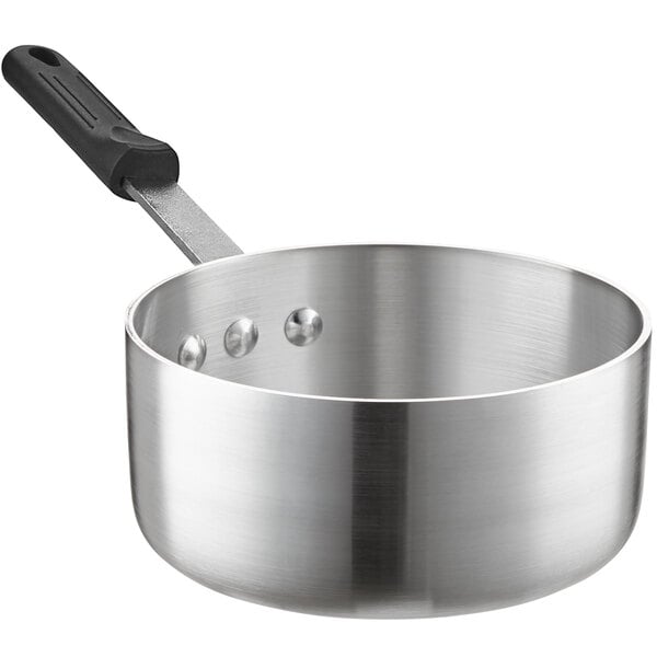 aluminum cookware - Can I use a metal spoon on aluminium pans