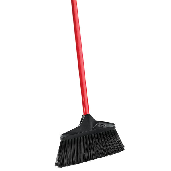 A close up of a red and black Libman 10" Lobby broom with a red handle.