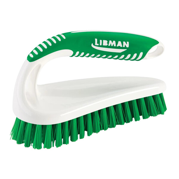 A white Libman Power Scrub Brush with a green and white handle.
