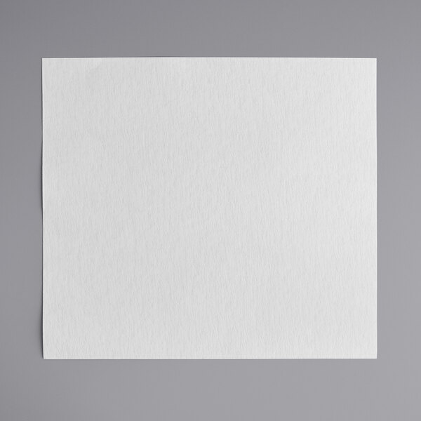A white square paper with a gray border.