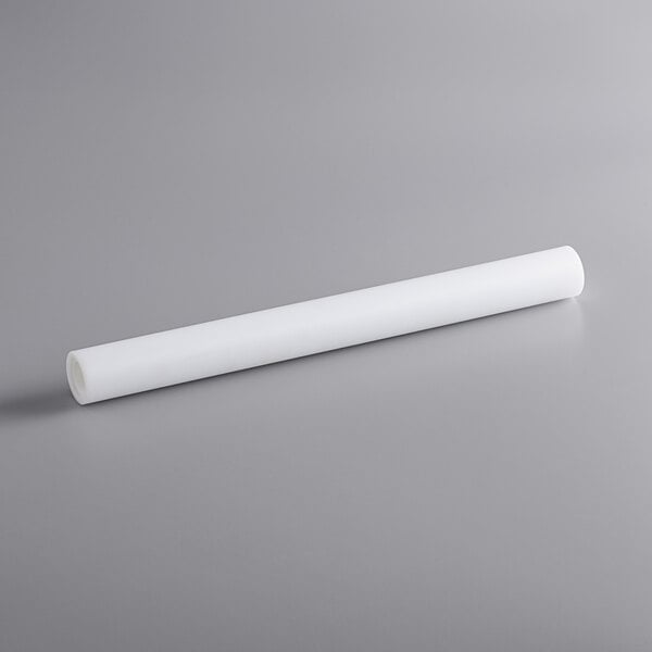A white plastic tube with a long handle.