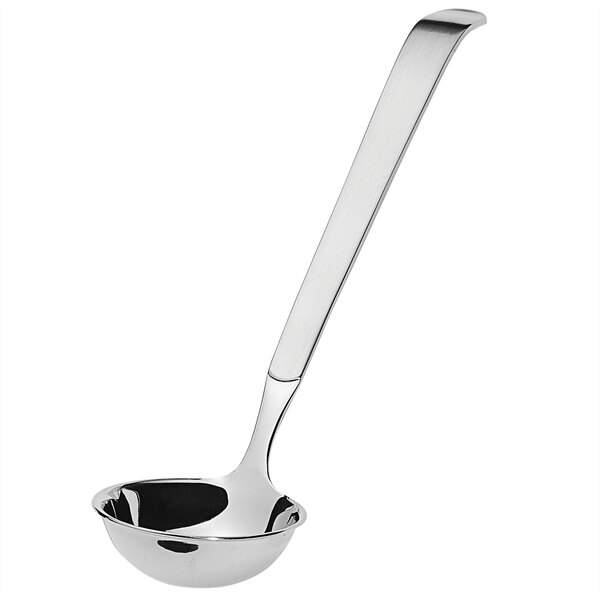 An Amefa stainless steel ladle with a long handle.