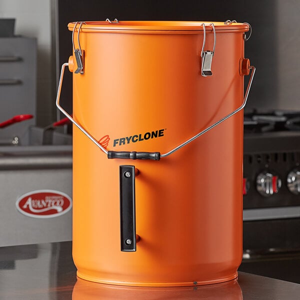 An orange Fryclone utility pail with a lid.