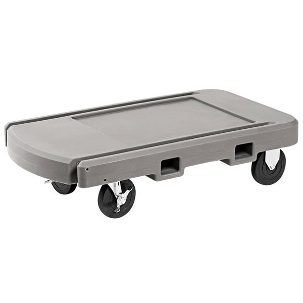 A Vollrath grey plastic utility dolly with black wheels.