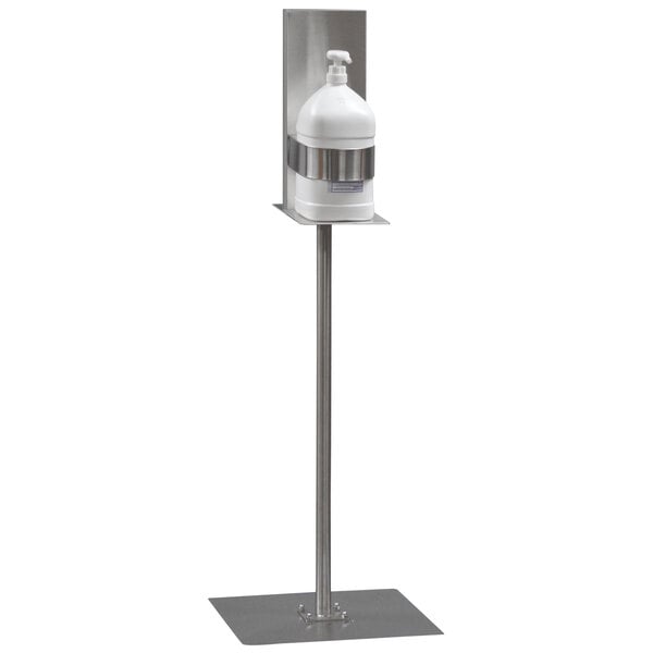 A Steril-Sil metal floor stand with a white liquid dispenser on it.