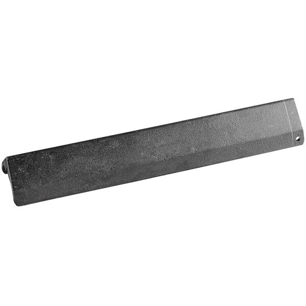 A black rectangular metal radiant with a handle on it.