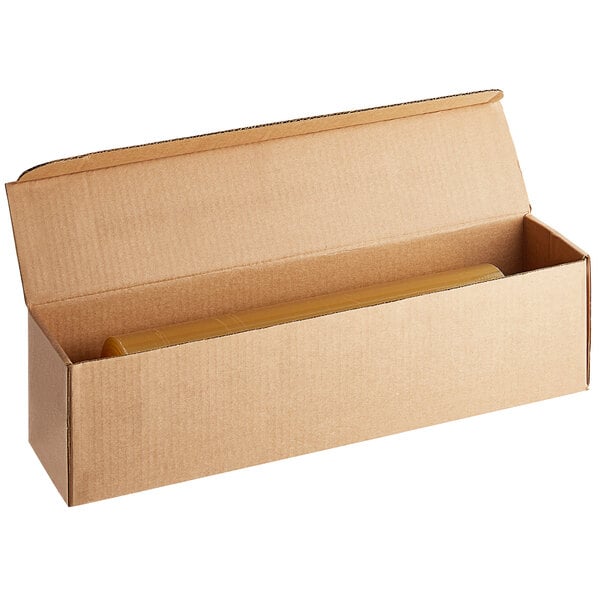 A cardboard box with a roll of Western Plastics all-purpose shrink wrap inside.