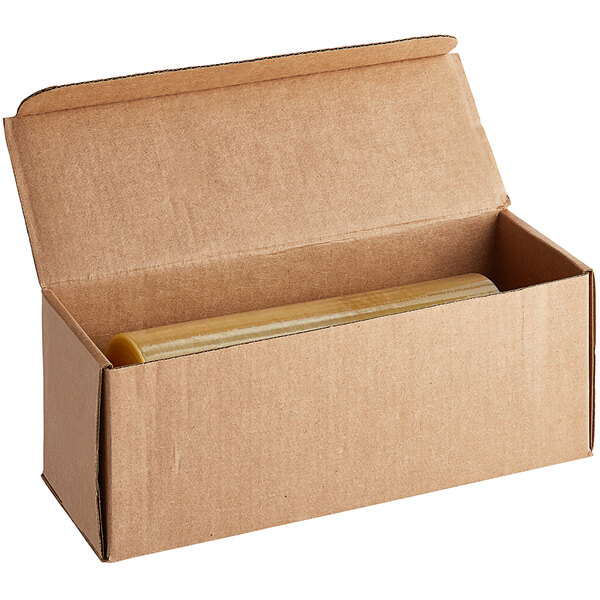 A Western Plastics cardboard box with a roll of perforated plastic inside.