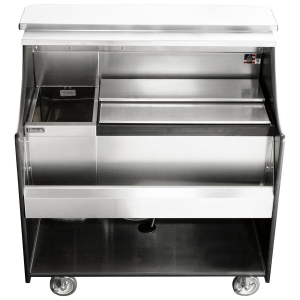 A silver Perlick mobile bar with a stainless steel counter and sink.