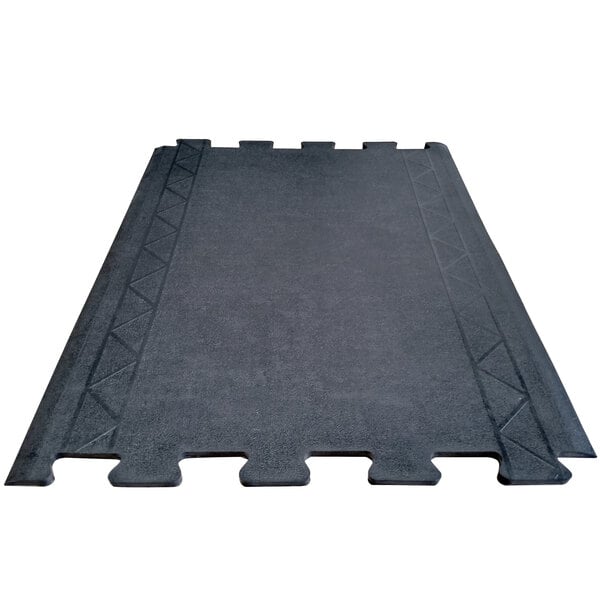 A black Cactus Mat anti-fatigue mat with four interlocking squares.
