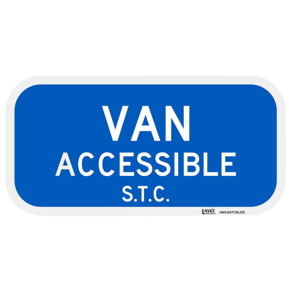 A blue rectangular sign with white text that says "Van Accessible / S.T.C."