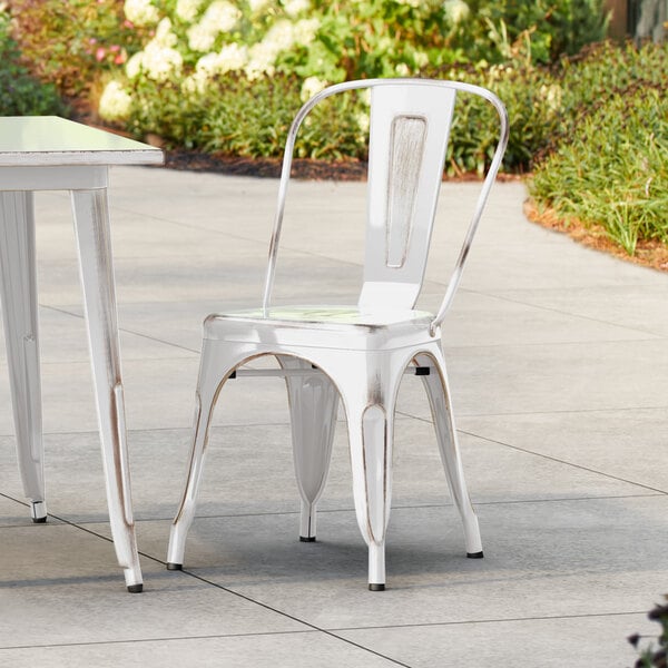 Lancaster Table & Seating Alloy Series Distressed Pearl White Outdoor Cafe Chair
