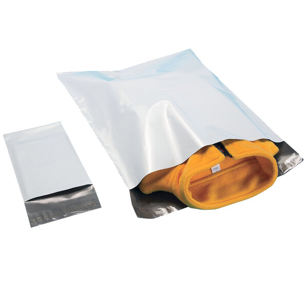A white plastic bag with a yellow jacket inside.