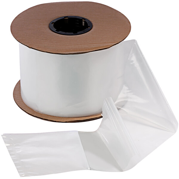A roll of clear plastic pre-opened bags with a white spool.
