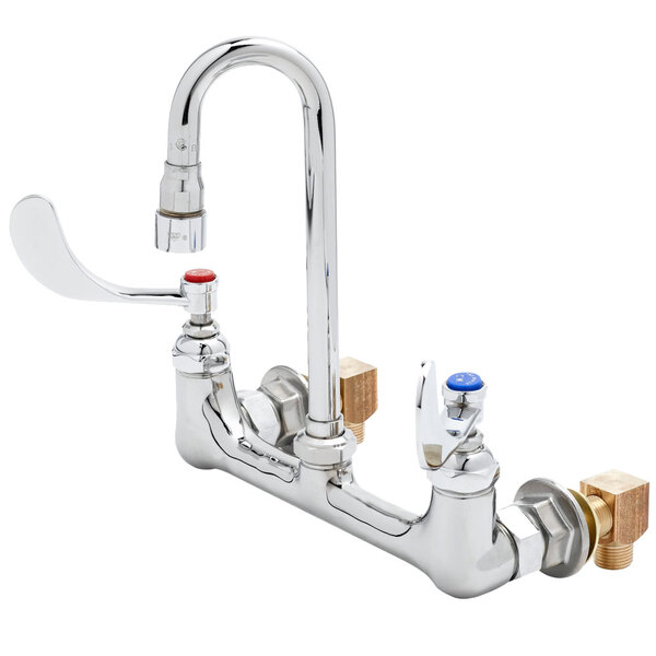 A chrome T&S wall mount pantry faucet with two handles and two spouts.