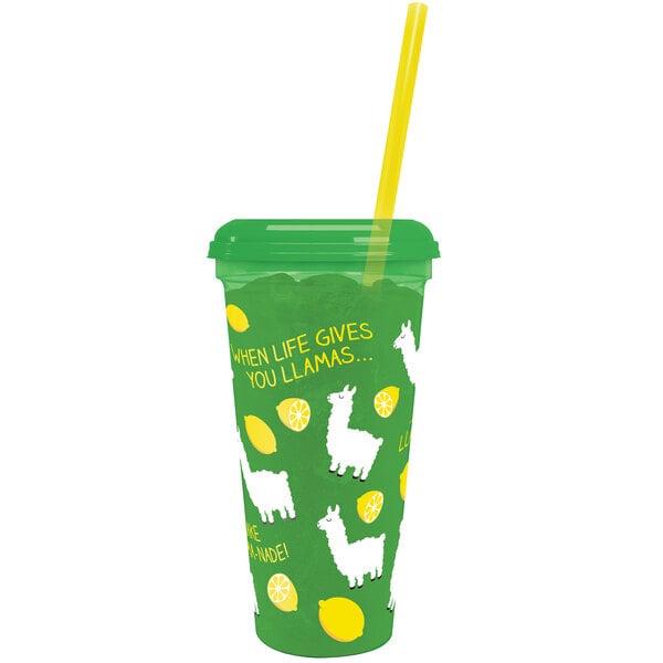 A green plastic souvenir cup with a straw and llama design.