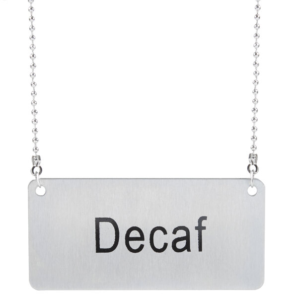 A silver chain with a "Decaf" label attached.