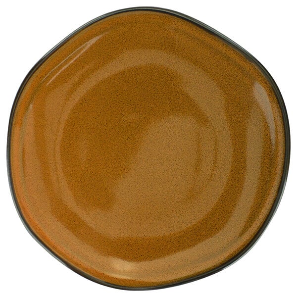 A close-up of a brown International Tableware Luna terracotta porcelain plate with a black rim.