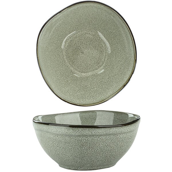 A white porcelain bowl with a gray exterior and a black rim.