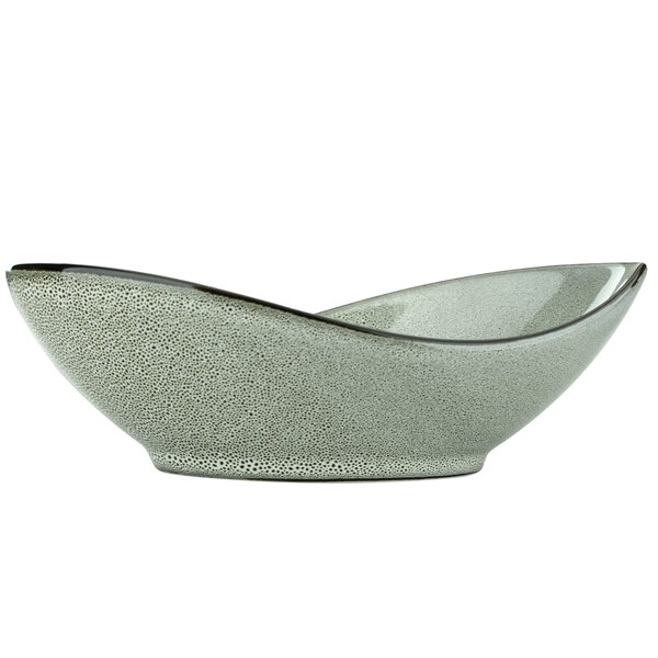 A white oval bowl with a black rim.