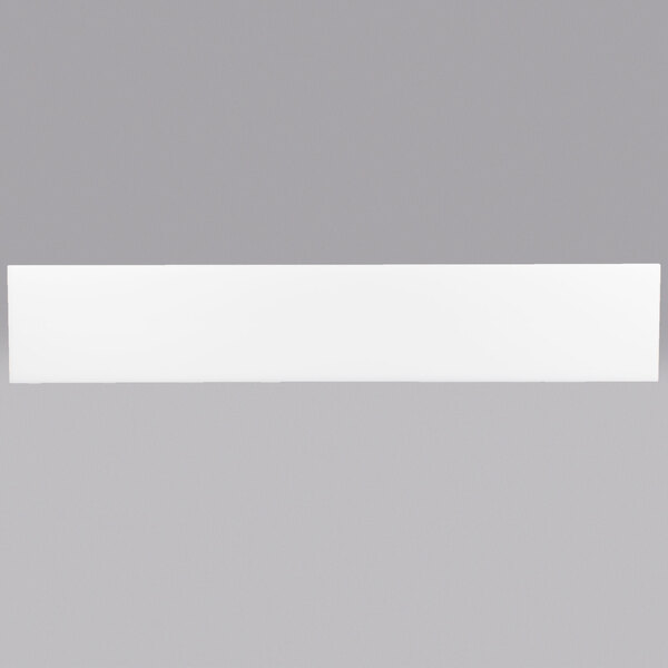 A white rectangular object with a black border.