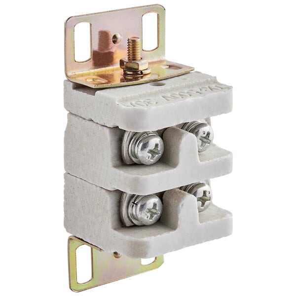 A close-up of a white plastic Avantco terminal block with screws.