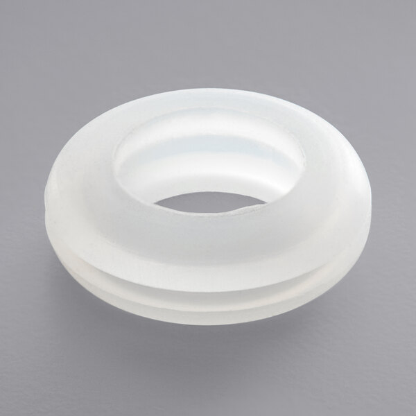 A white round silicone grommet with a hole in the middle.