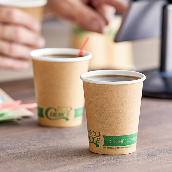 Two EcoChoice kraft paper hot cups on a table